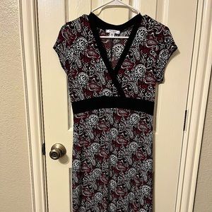 Red, black, and white knee length dress
